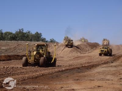 GPS Grader takes control of the scraper operation.