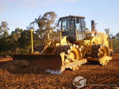 CAT 825 Compactor placing fill with the aid of GPS.