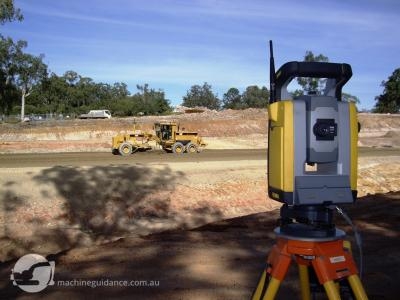 Total station guidance is perfect for trimming gravel pavements.